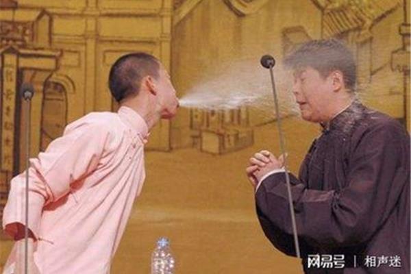 嗤之以鼻什么意思